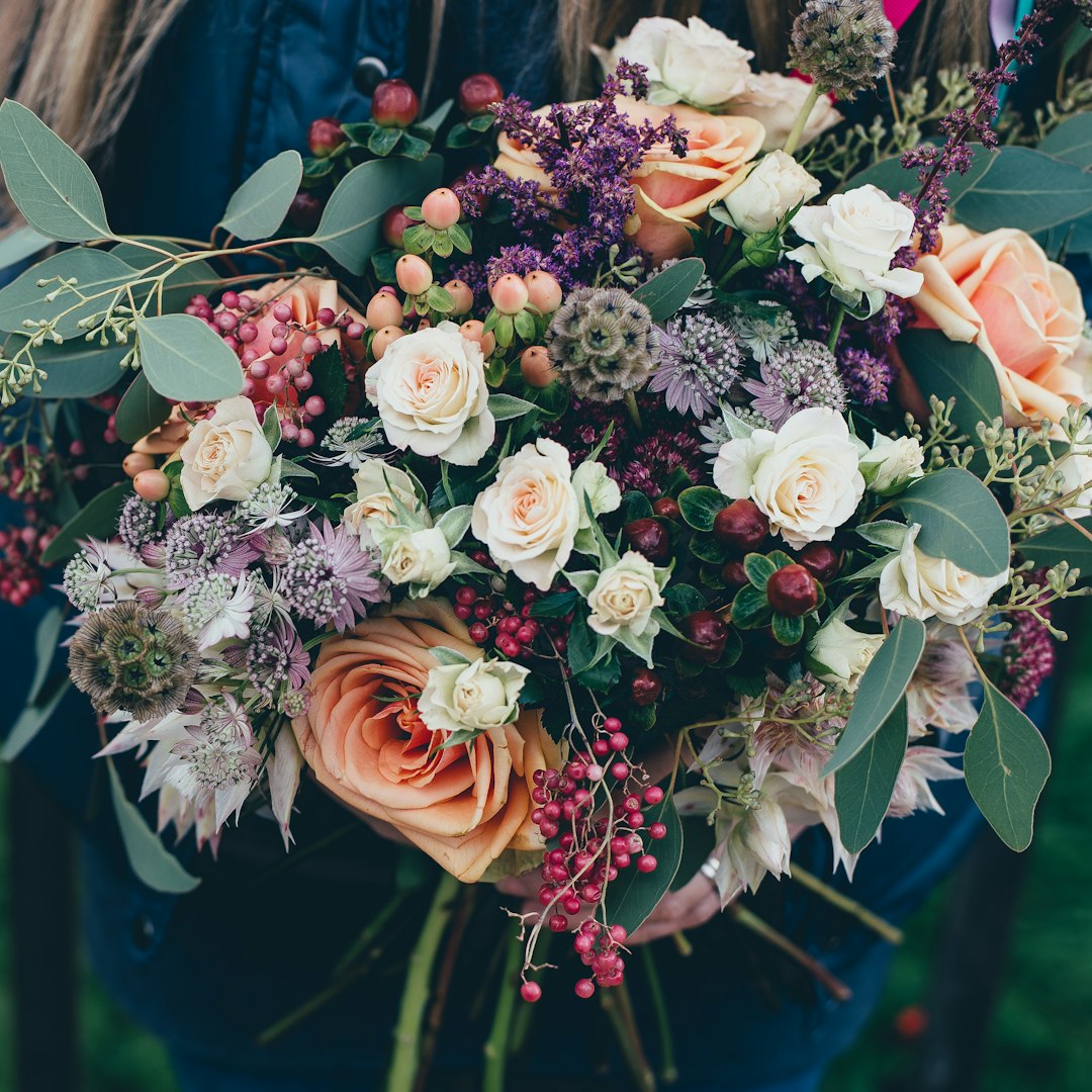 Garden-style bouquet with eucalyptus and soft peach roses